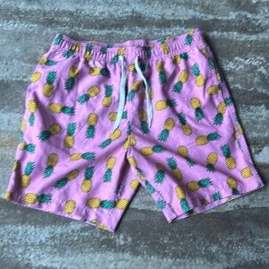 Pink Pineapple swim trunks